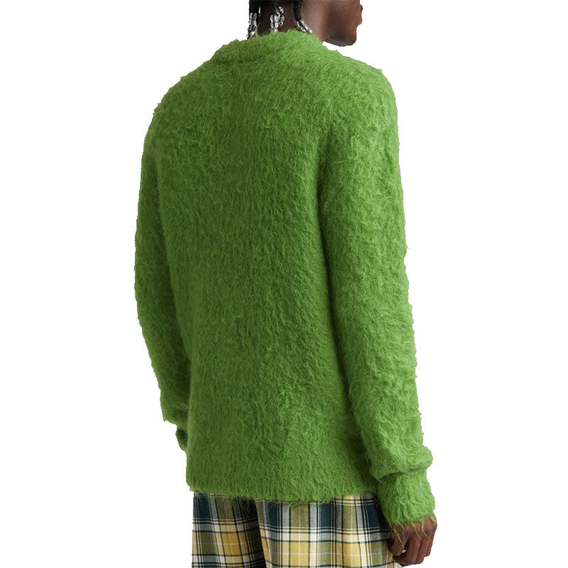 Back view of a model wearing a custom green acrylic mohair knit sweater.