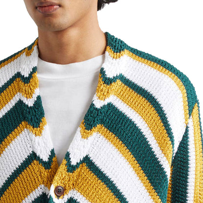 Close-up of a model's upper body showcasing the detailed knit pattern and button closure of a custom stripe cardigan.