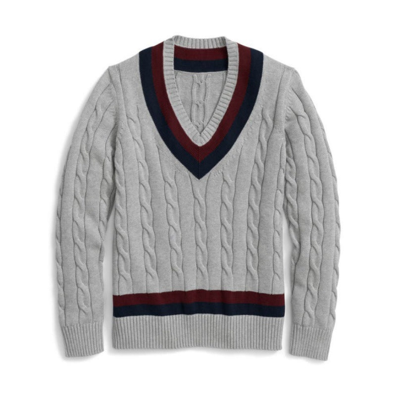 Gray 100% cotton V-neck sweater featuring classic cable knit design with navy and red striped accents on the collar and waistband, presented on a plain background.