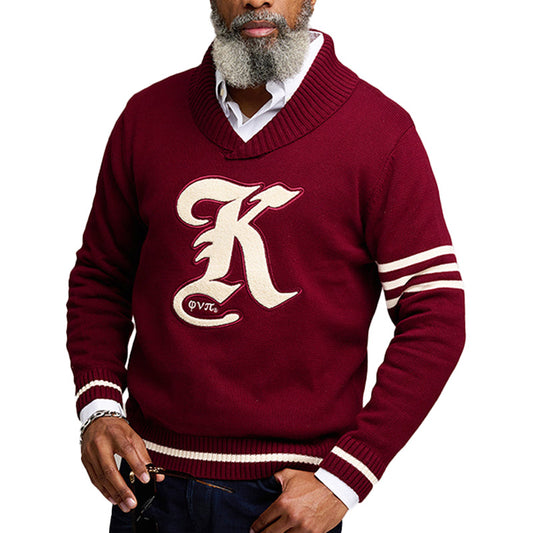 An older gentleman wearing a maroon custom fraternity sweater with white stripes on the sleeves and the text 'K' on the front, holding a pair of sunglasses.