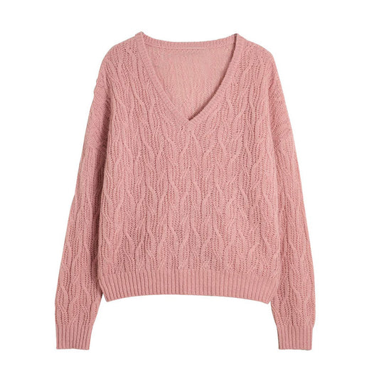 Front view of a pink custom wool blend cable knit sweater with a V-neck.