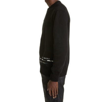 Side view of man wearing a custom logo knit pullover sweater