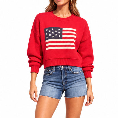 Front view of red crew neck sweater featuring a large American flag graphic