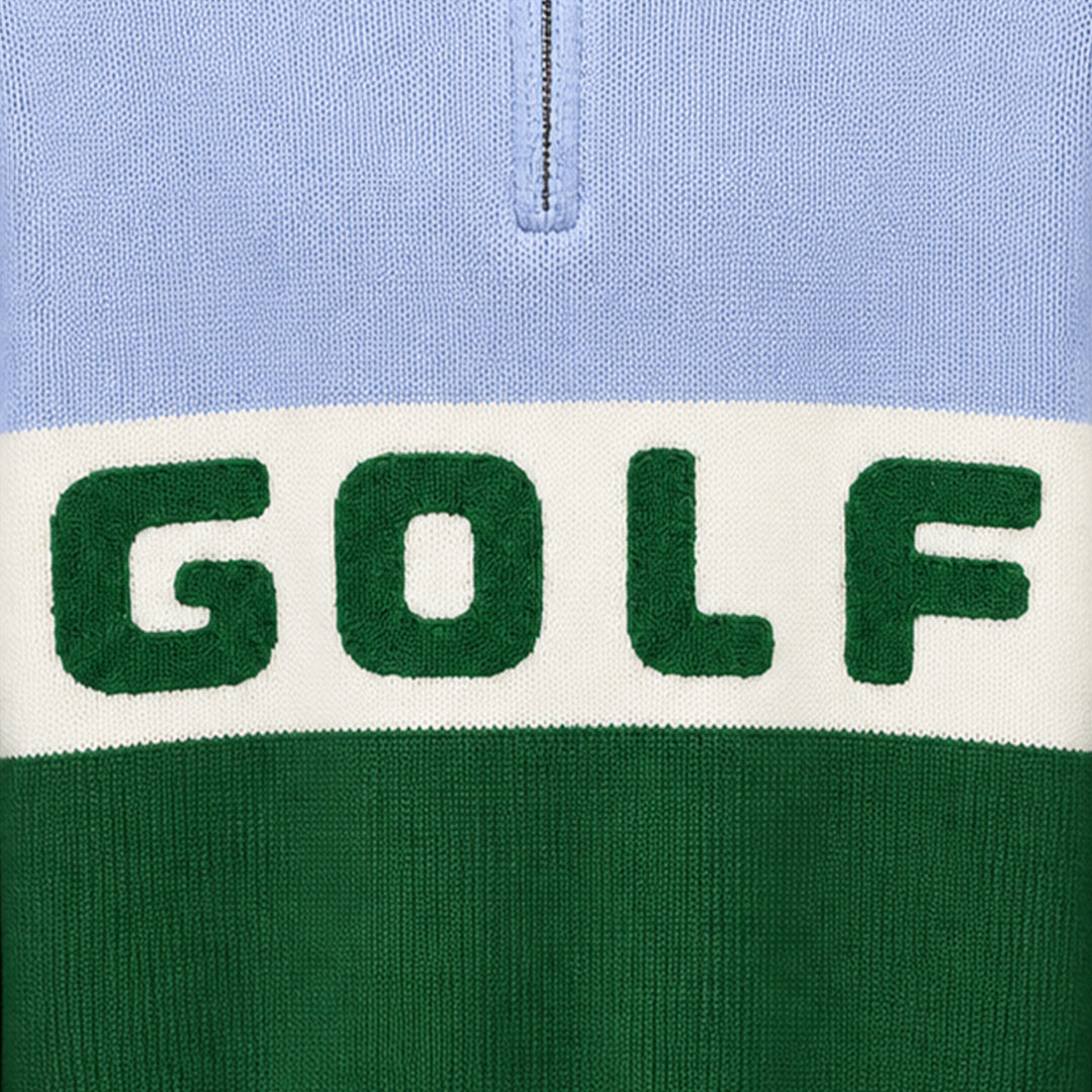 Close-up of green GOLF lettering on a colour-block knit pullover