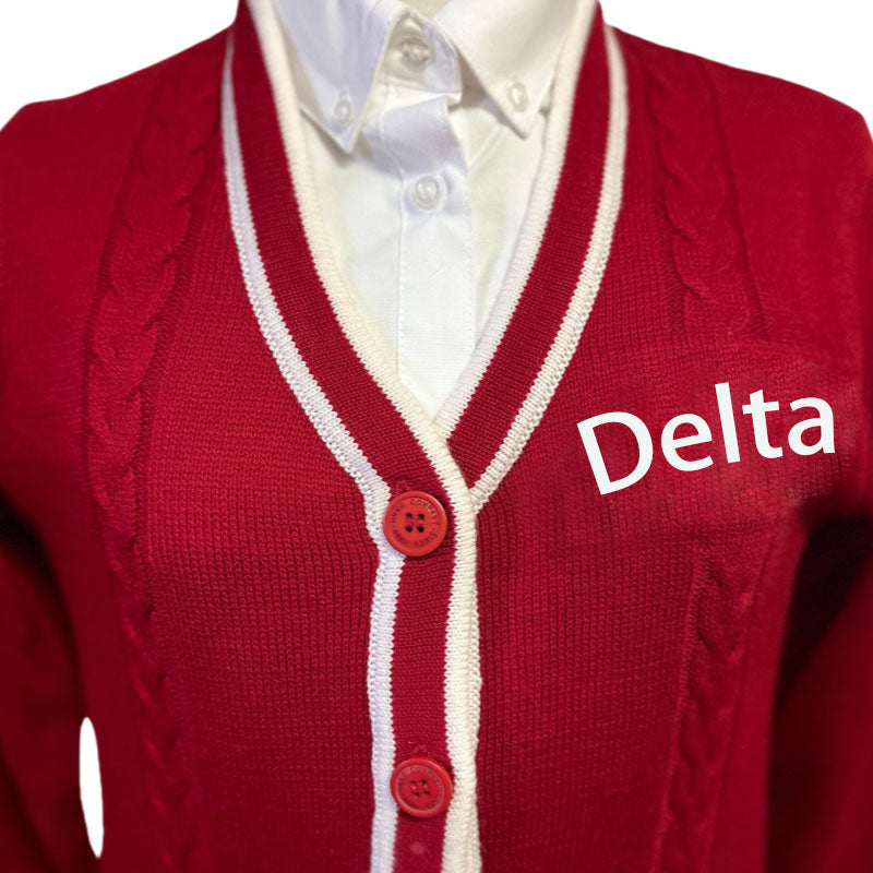 Red cardigan with white trim and "Delta" embroidered on the chest