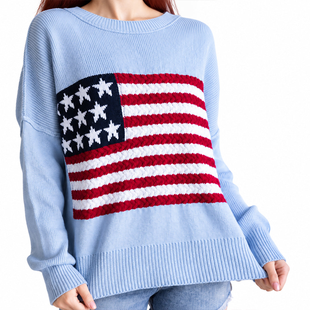 Front view of light blue knit sweater featuring a red white and blue flag motif