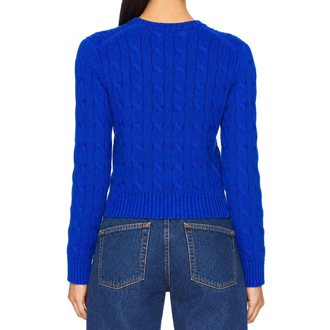 Back view of blue long sleeve knit pullover with ribbed hem