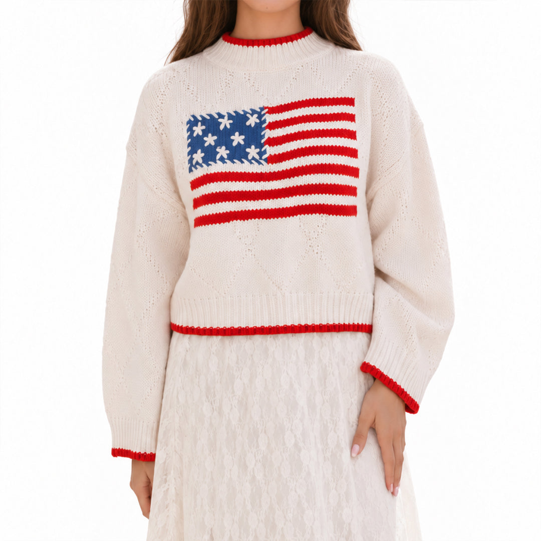 Front view of cream American flag graphic sweater with red accents