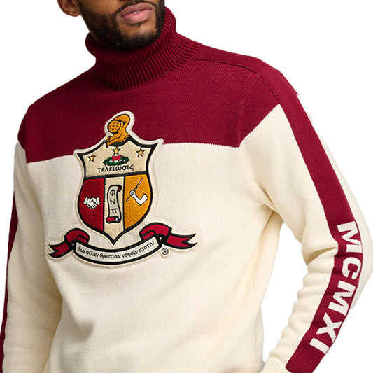 Close-up of a man wearing a custom knit fraternity sweater with 'Kappa Alpha Psi' Embroidery Logo on the front and a red and cream color scheme, showing detailed knitwork.