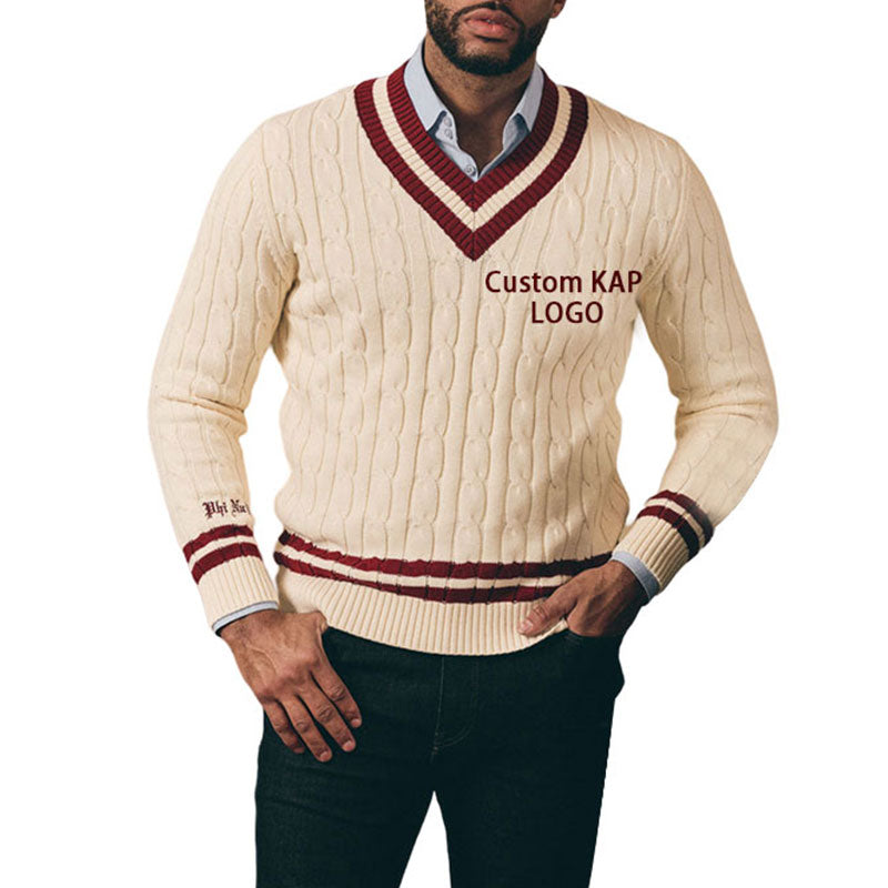 Man in cream cable knit sweater with maroon trim and "Custom KAP LOGO" embroidery