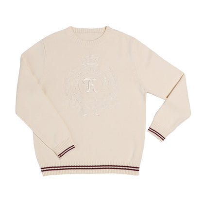 Custom Greek sweater in cream with cream embroidered 'Kappa Alpha Psi' Logo, laid flat.