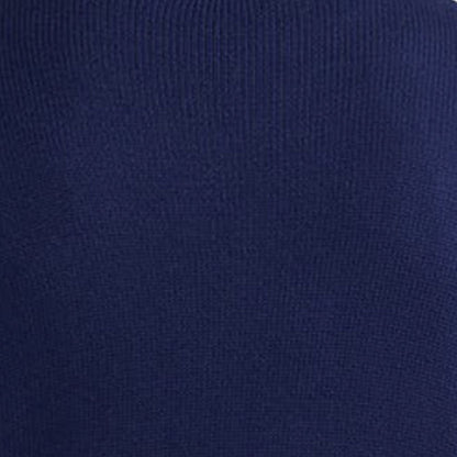 Close-up detail of the navy blue custom cashmere cardigan fabric, highlighting the fine knit texture.