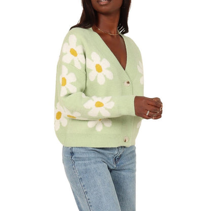 A light green V-neck sweater with white embroidered daisies, designed for women.