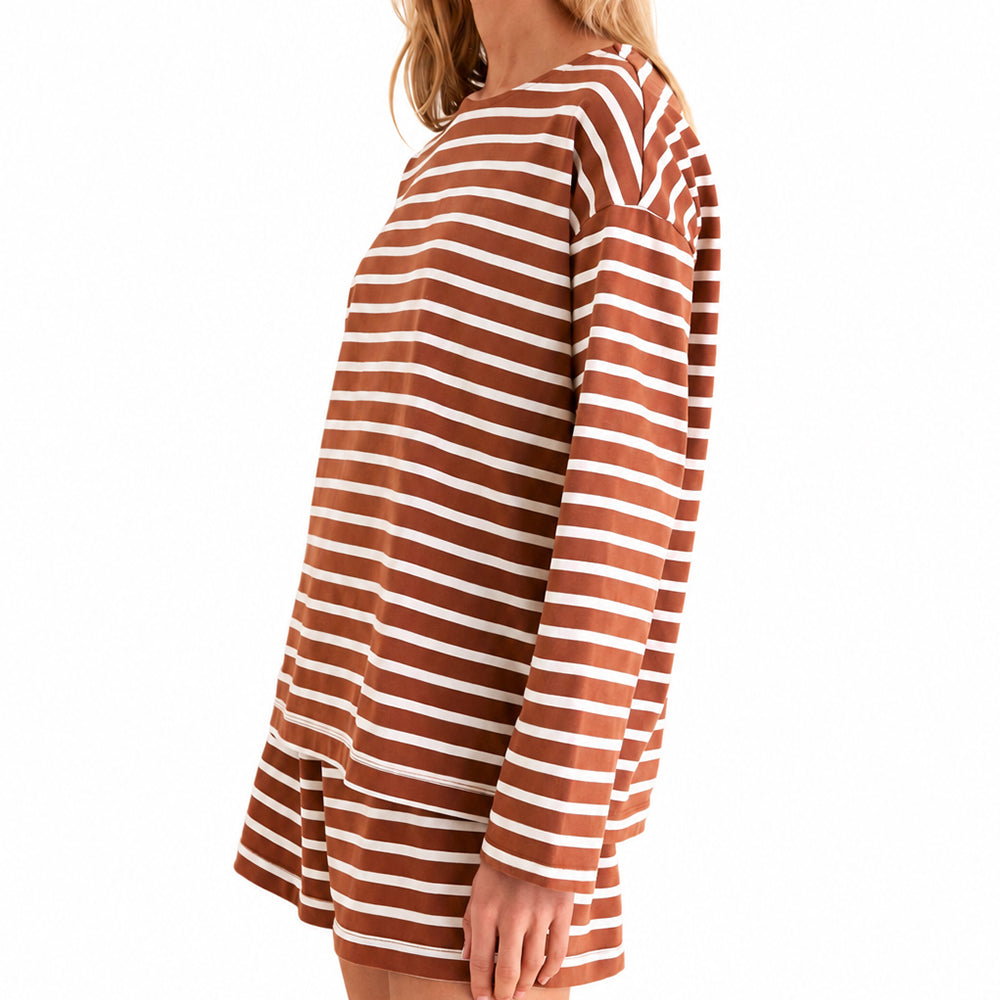 Side view of a brown and white striped long-sleeve crew-neck top with matching shorts.