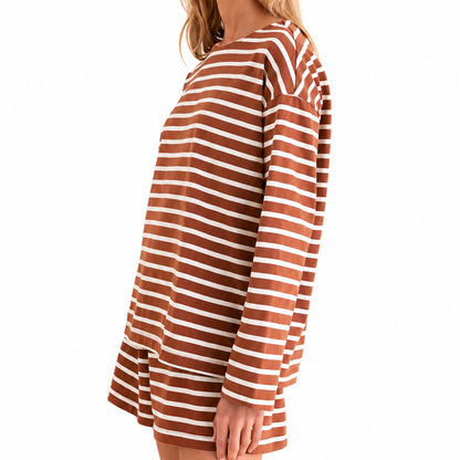 Side view of a brown and white striped long-sleeve crew-neck top with matching shorts.