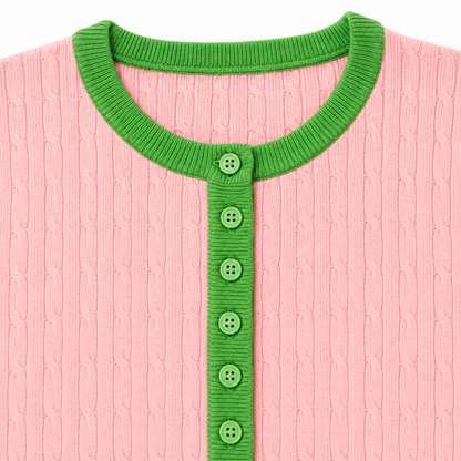 Close-up of apple green ribbed crew neck, button placket, and matching knit buttons 