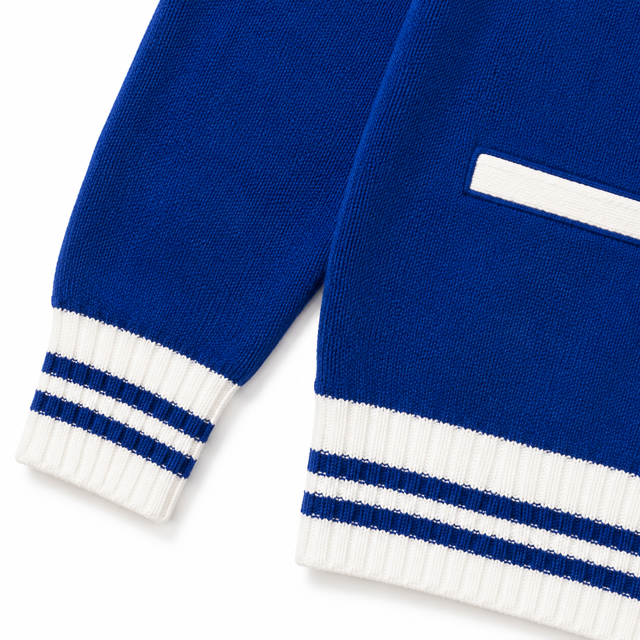 Royal blue cardigan sleeve cuff and hem with white ribbing and double blue stripe bands 