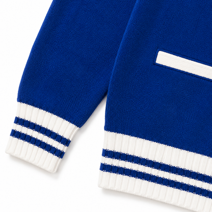 Royal blue cardigan sleeve cuff and hem with white ribbing and double blue stripe bands 