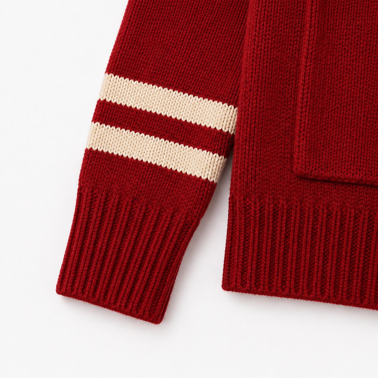 Red collegiate cardigan sleeve detail with white stripe accents and ribbed knit cuffs for a classic varsity style