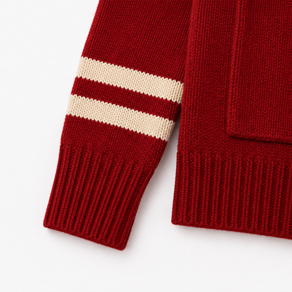 Red collegiate cardigan sleeve detail with white stripe accents and ribbed knit cuffs for a classic varsity style