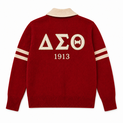Red Greek letter cardigan with Delta Sigma Theta lettering and 1913 year embroidery on the back