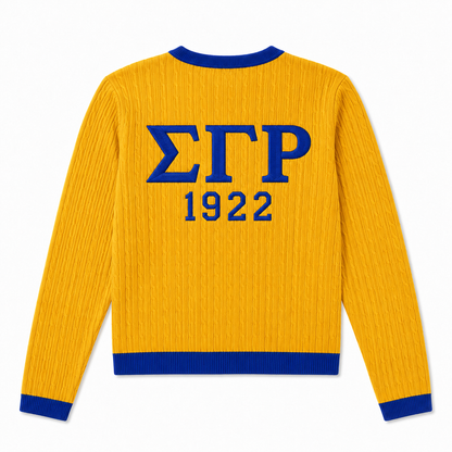 Yellow collegiate knit cardigan featuring ΣΓΡ Greek lettering and 1922 year detail on the back with blue accents