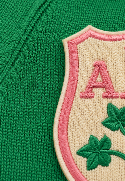 Closeup: shield embroidered patch with letter A & clover