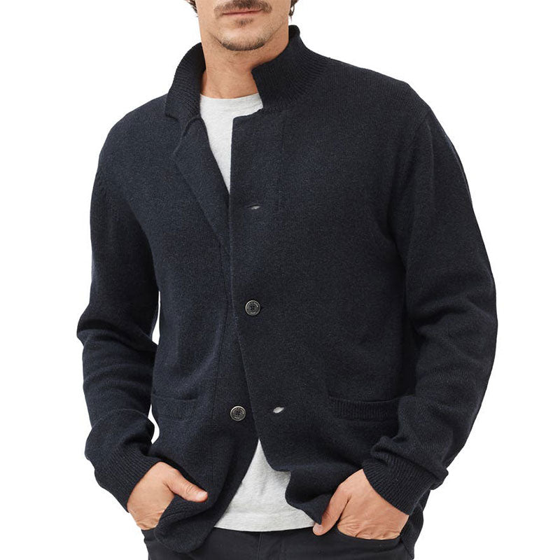 Model wearing a dark navy blue custom cotton blend cardigan with pockets, showing the front design and casual style.