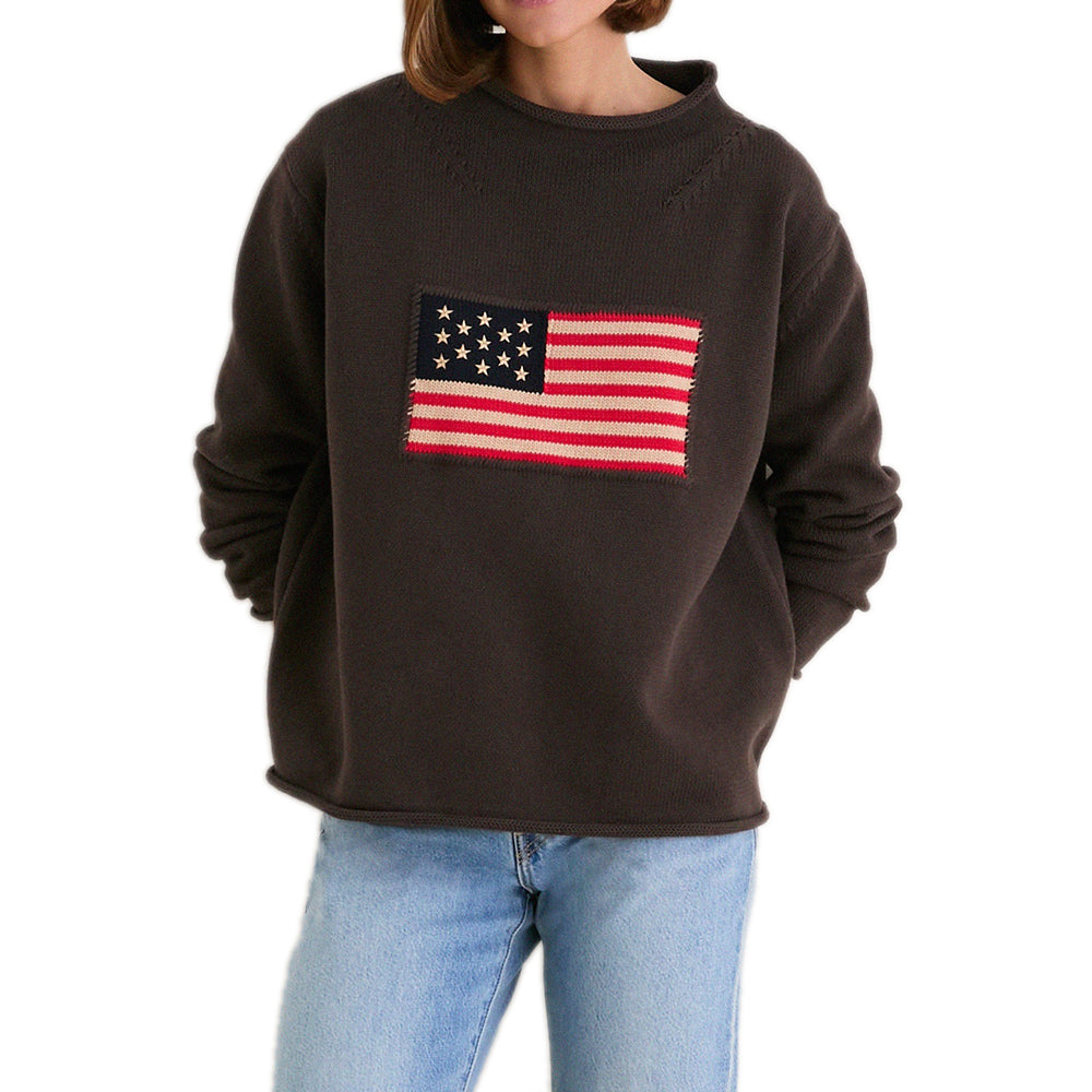 Dark brown relaxed crew-neck sweater with a red, cream and navy knitted American flag motif.