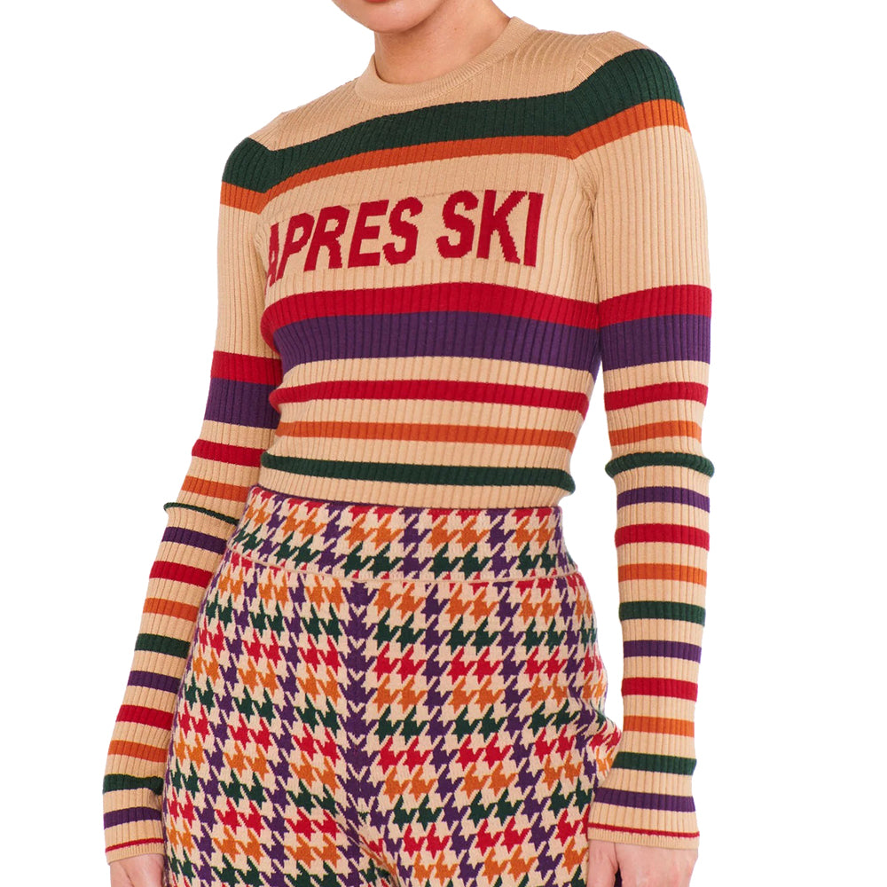 Front angled view of beige rib knit sweater with colorful stripes and graphic lettering across the chest.