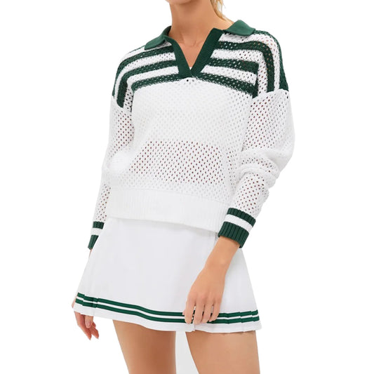 Angled view of white openwork polo sweater with dark green contrast details and cropped silhouette.