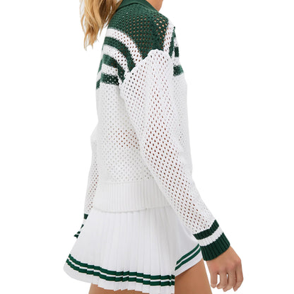 Side view of white openwork knit sweater with dark green striped shoulder panel and ribbed sleeve cuffs.