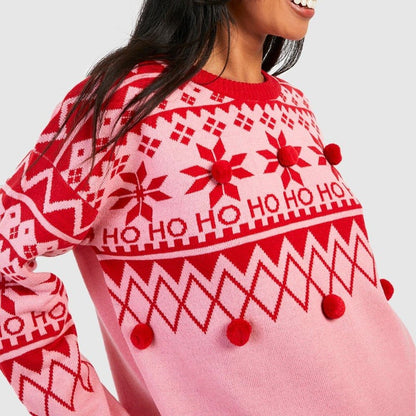 "custom-womens-christmas-sweater-pom-pom-side-view.jpg" "Side view of a custom women's Christmas sweater with red and pink Ho Ho Ho design and pom-poms by PAPAGARMENT"