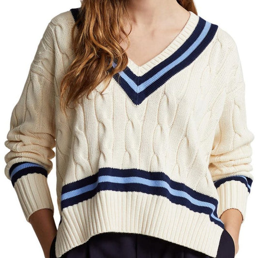 Elegant cabled cotton sweater with V-neck and navy-blue stripes on the cuffs and waistband by a custom sweater manufacturer.