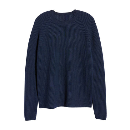 Flat lay of a navy blue wool blend men's knit pullover sweater with raglan sleeves and rib design.