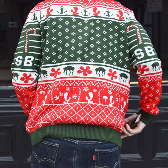 Back view of a person wearing a custom SpongeBob Christmas sweater with festive red, green, and white patterns including anchors, candy canes, and various holiday symbols.