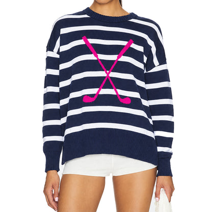 Women's navy and white striped sweater with pink crossed-stick graphic