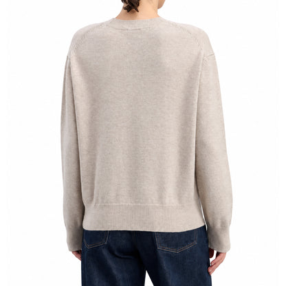 Back view of women's V-neck knit sweater