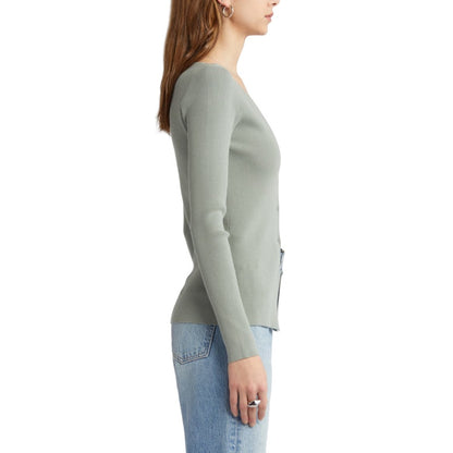 A light green V-neck sweater with ribbed texture, designed for mature women.