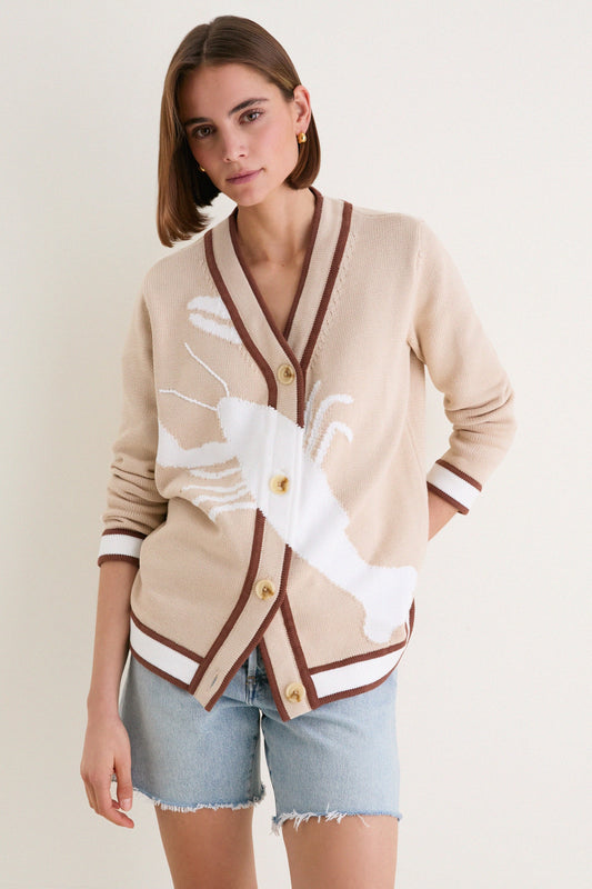 Front view of casual knitted cardigan with graphic pattern and button closure.