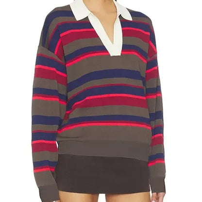 Close front view of a charcoal striped polo sweater with a white V-neck collar and ribbed hem.
