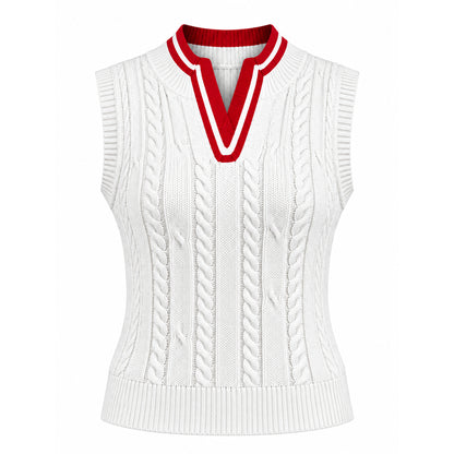 White sleeveless cable knit sweater vest with red V-neck and armhole trim
