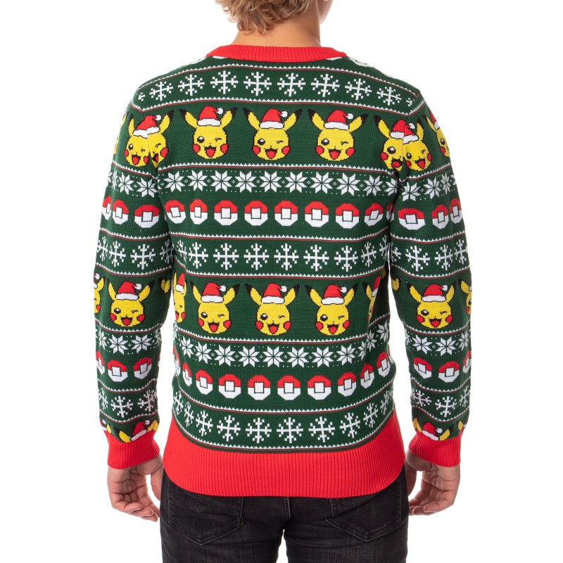 Back view of a man wearing a festive green cardigan sweater featuring Pikachu in a Santa hat, Poké Balls, and snowflakes, designed for holiday celebrations.