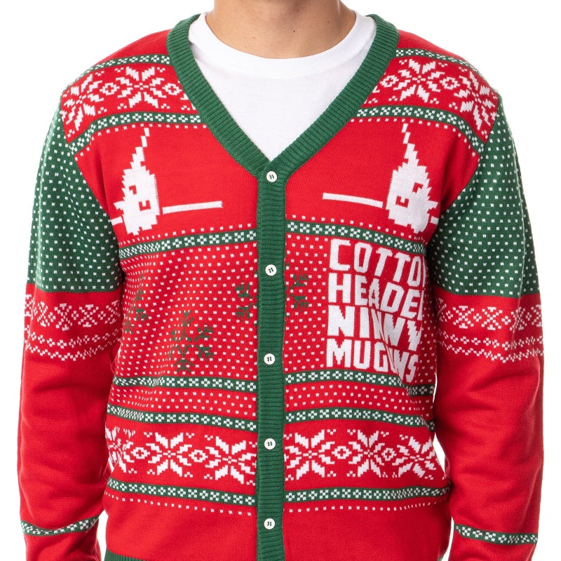 Front view of a man wearing a red and green cotton Christmas sweater featuring a festive design inspired by the movie 'Elf
