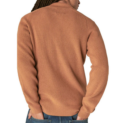 Back view of a man wearing a camel-colored ribbed knit polo sweater, highlighting the texture and fit of the garment.