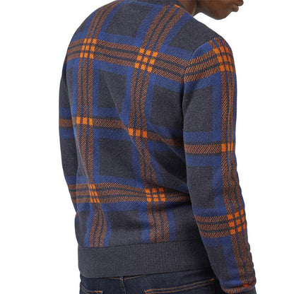 Back view of a custom cotton blend knit sweater featuring a jacquard geometric figure design in navy blue and orange, worn by a man.