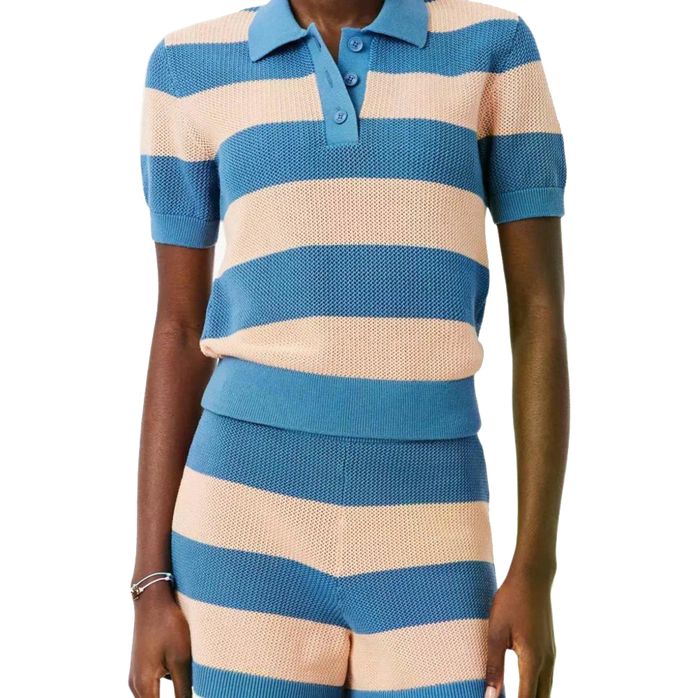 Model wearing a blue and beige striped knitted polo sweater with matching knit shorts in a coordinated outfit.