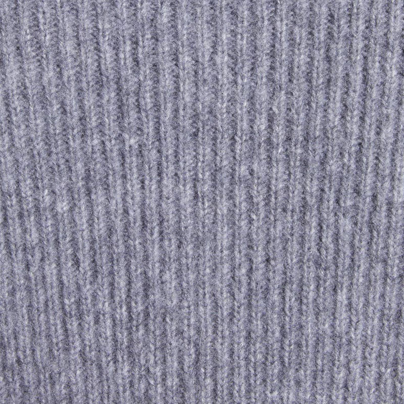 Close-up detail of the light grey custom shawl collar cashmere cardigan fabric, highlighting the ribbed knit texture.