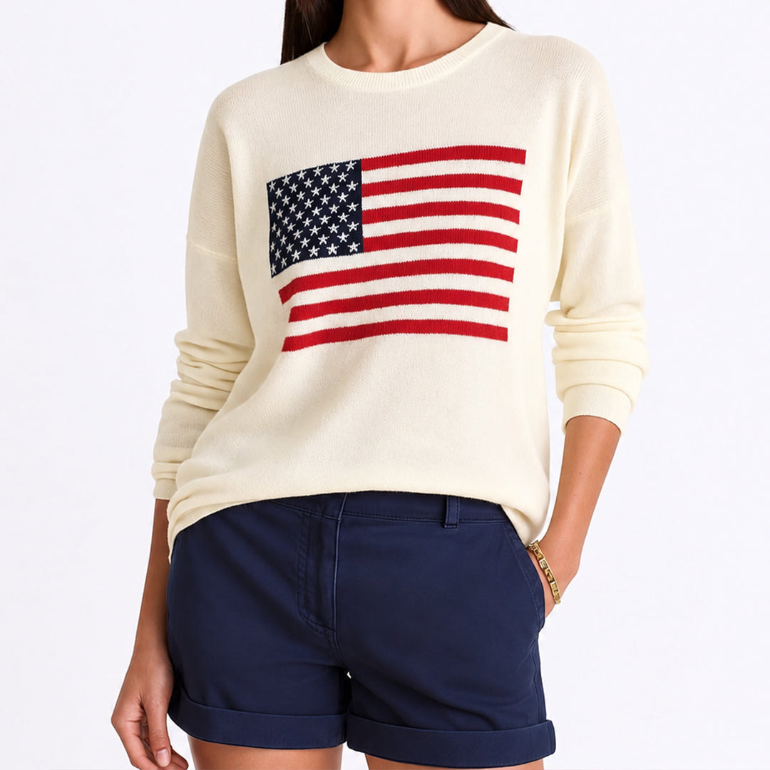 Model wearing cream American flag knit sweater with dark shorts