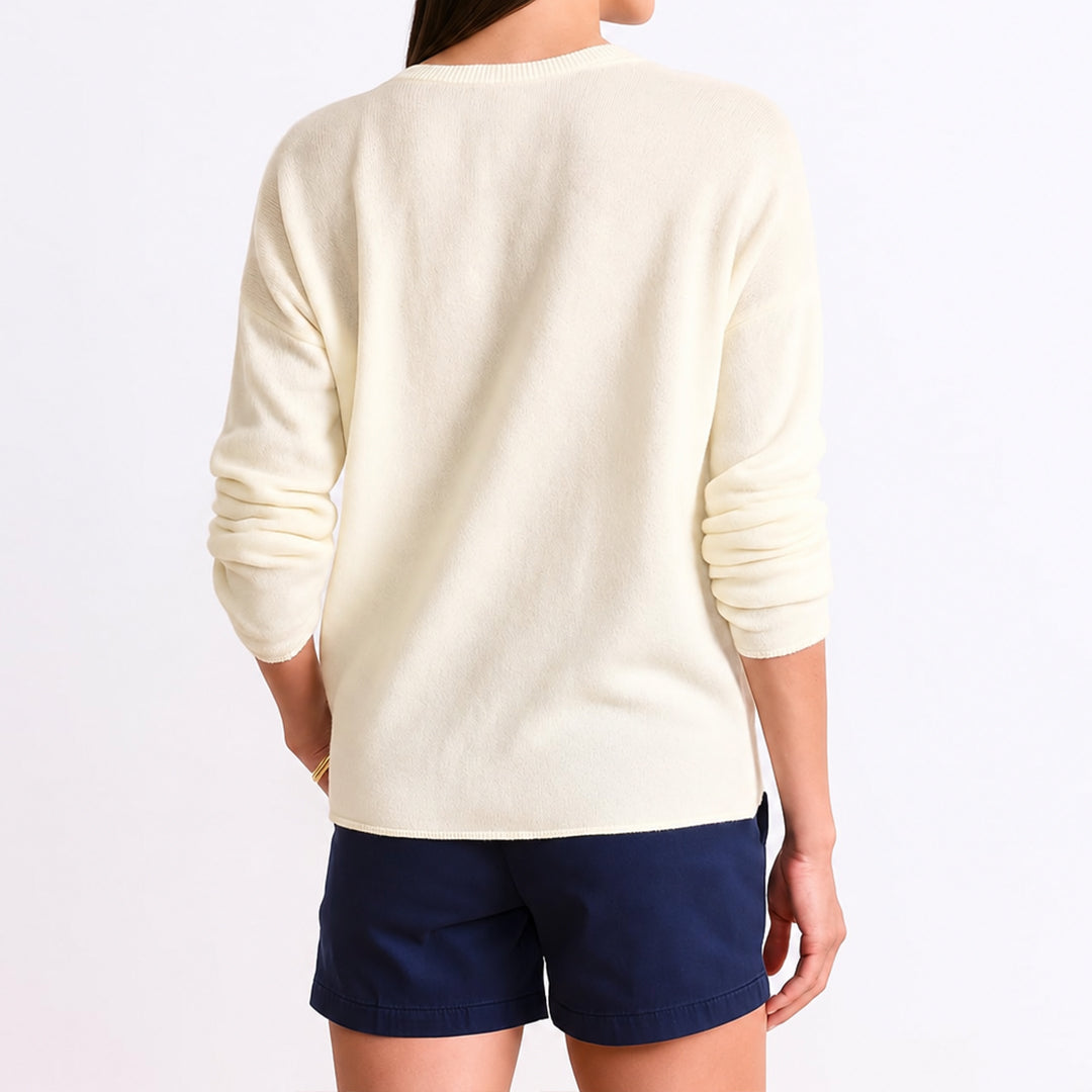 Back view of cream long sleeve crew neck sweater